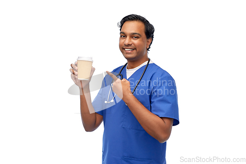 Image of male doctor with stethoscope drinking coffee