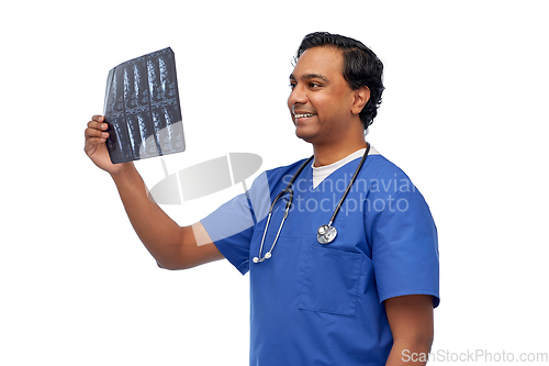 Image of happy indian doctor or male nurse with x-ray