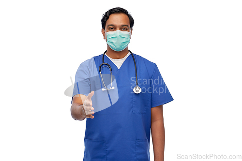 Image of indian male doctor in blue uniform and mask