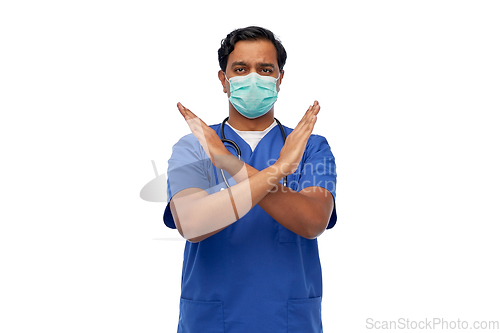 Image of indian male doctor mask showing refusal gesture