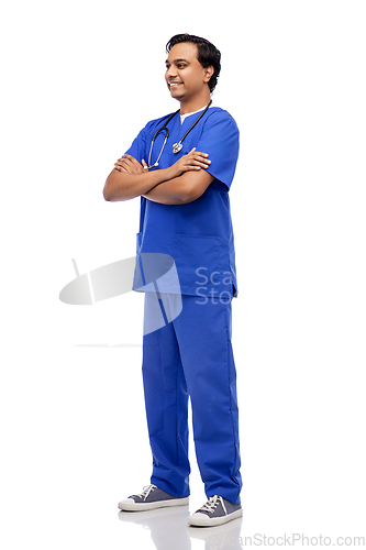 Image of happy indian doctor or male nurse in blue uniform