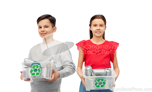 Image of smiling children sorting metallic waste