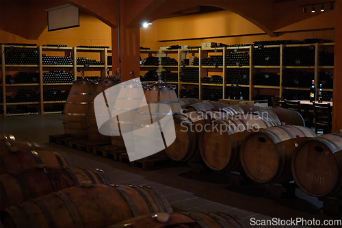 Image of Winery cellar with wine barrels