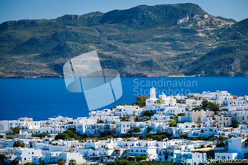 Image of View of Plaka village with traditional Greek church. Milos island, Greece