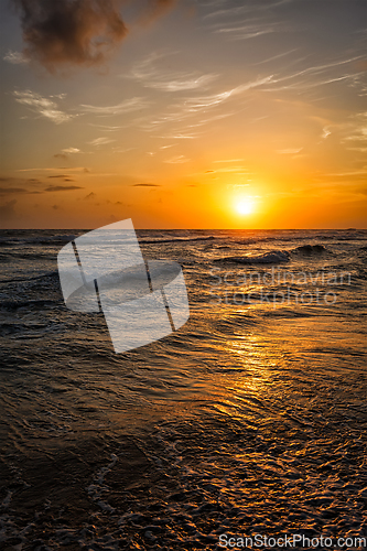 Image of Ocean sunset with waves