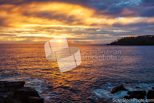 Image of Ocean sunset with dramatic sky