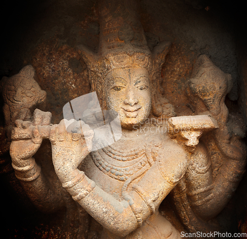 Image of Krishna bas relief in Hindu temple. Sri Ranganathaswamy Temple. Tiruchirappalli (Trichy), Tamil Nadu, India