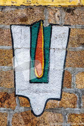 Image of Vushnu symbol on Hindu temple wall