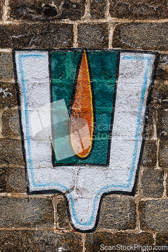 Image of Vushnu symbol on Hindu temple wall