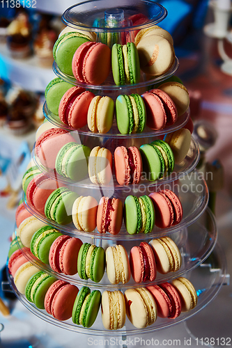 Image of Selection of decorative desserts on buffet table at catered event