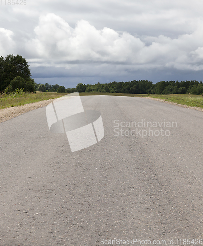 Image of old dusty paved road