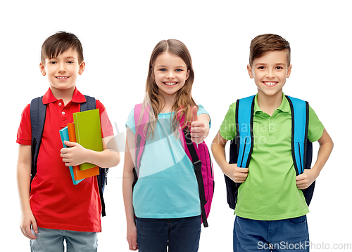 Image of happy children with school bags showing thumbs up