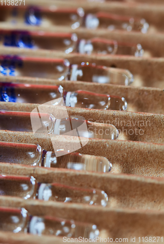 Image of Medical ampules on a red background, selective focus. 