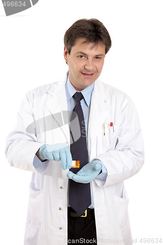 Image of Doctor or vet with prescrption medicine