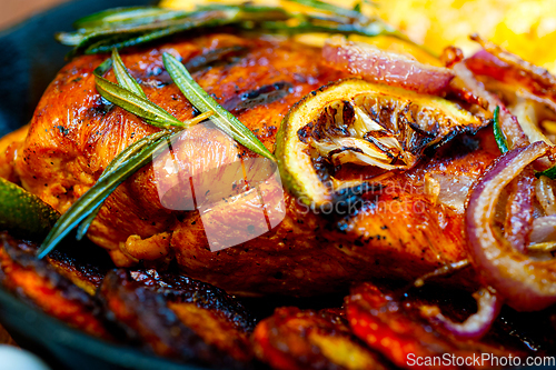 Image of roasted grilled BBQ chicken breast with herbs and spices