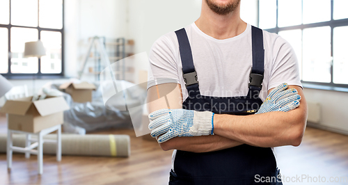 Image of close up of builder in gloves at new home