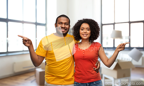 Image of happy african american couple at new home