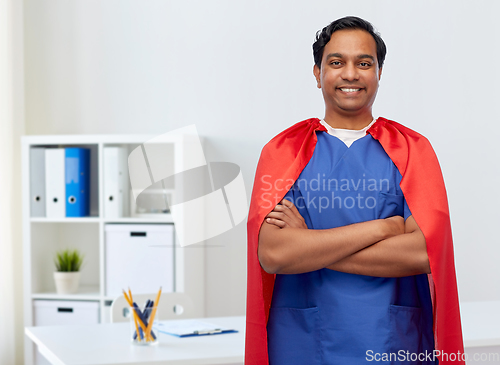 Image of smiling doctor or male nurse in superhero cape