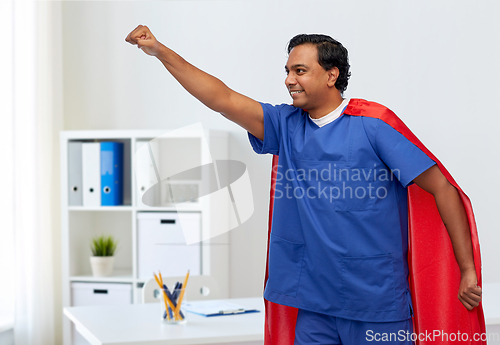 Image of smiling doctor or male nurse in superhero cape