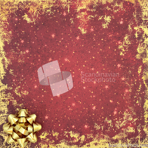 Image of Christmas and New Year Gold Bow Abstract Background on Red