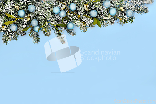 Image of Christmas Snow Fir Tree Blue Bauble Background