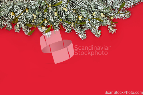 Image of Christmas Winter New Year Snow Fir and Mistletoe Red Background