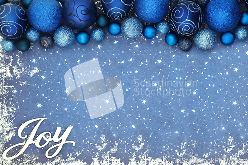 Image of Joy at Christmas Festive Blue Bauble Background 