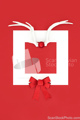 Image of Festive Christmas Reindeer Antler Red Background