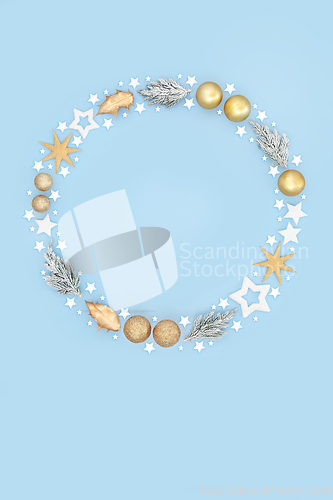 Image of Christmas Wreath with Winter Flora and Tree Ornaments