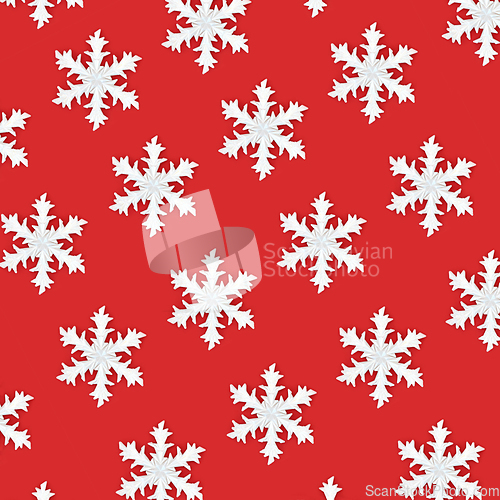 Image of Christmas Snowflake Abstract Pattern on Red Background