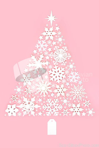 Image of Fun Christmas Tree Decoration with Snowflakes and Stars 