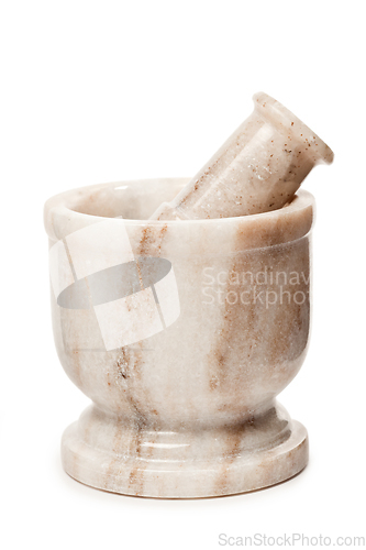 Image of Marble mortar and pestle on white