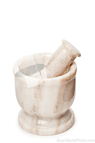 Image of Marble mortar and pestle on white