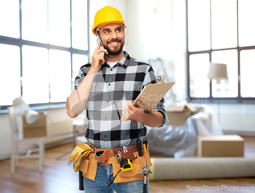 Image of builder calling on smartphone at home