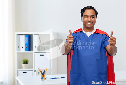 Image of male doctor in superhero cape showing thumbs up