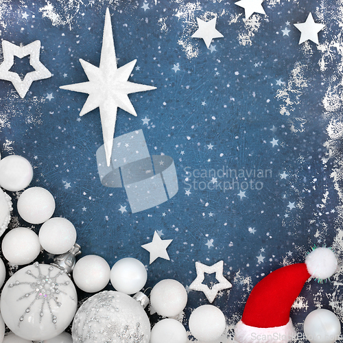 Image of Magical Christmas Eve Background with Santa Hat and Baubles