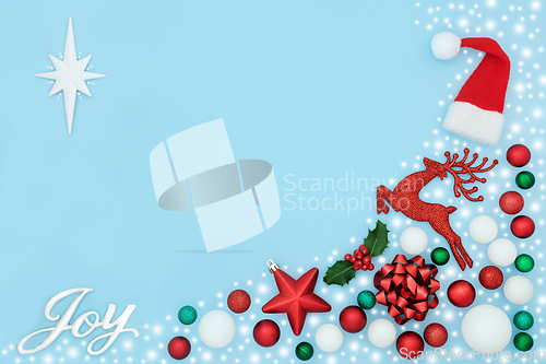 Image of Christmas Joy Snow and Tree Decorations Abstract Background