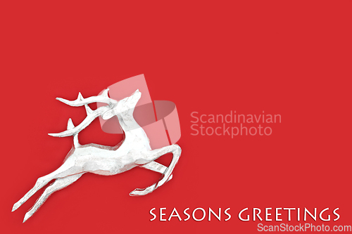 Image of Seasons Greetings Christmas Eve Reindeer Minimal Background