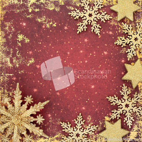 Image of Christmas Snowflake and Star Background Border on Grunge Red 