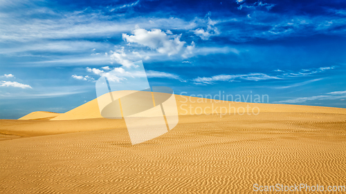 Image of Desert sand dunes on sunrise