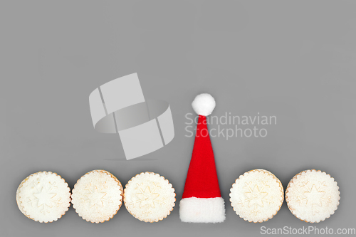 Image of Christmas Santa Hat and Traditional Mince Pies