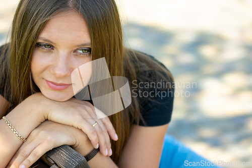 Image of Close-up portrait of a beautiful girl of Slavic appearance, the girl has a thoughtful look