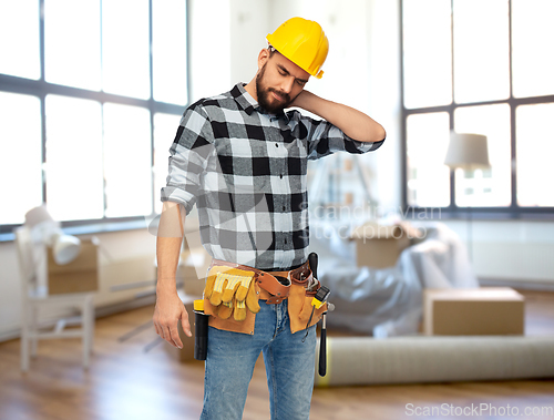 Image of male worker or builder with neck pain at home