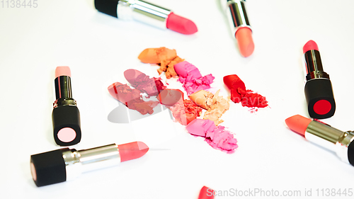 Image of Creative concept photo of cosmetics swatches on white background