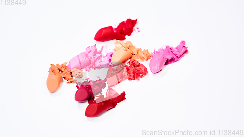 Image of Creative concept photo of cosmetics swatches on white background