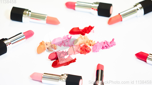 Image of Creative concept photo of cosmetics swatches on white background