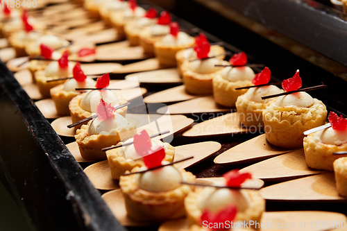 Image of Canapes with dessert on the banquet table.