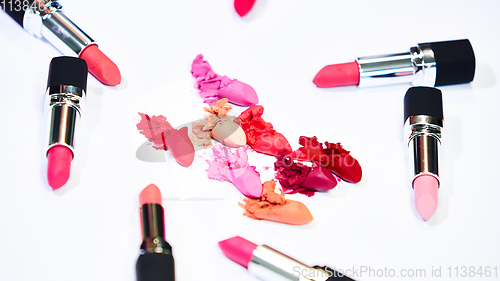 Image of Creative concept photo of cosmetics swatches on white background