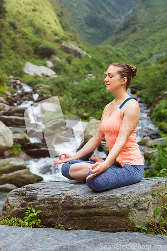 Image of Woman in Padmasana outdoors