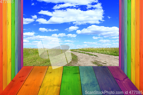 Image of multicolored bright stand from wooden boards and sky